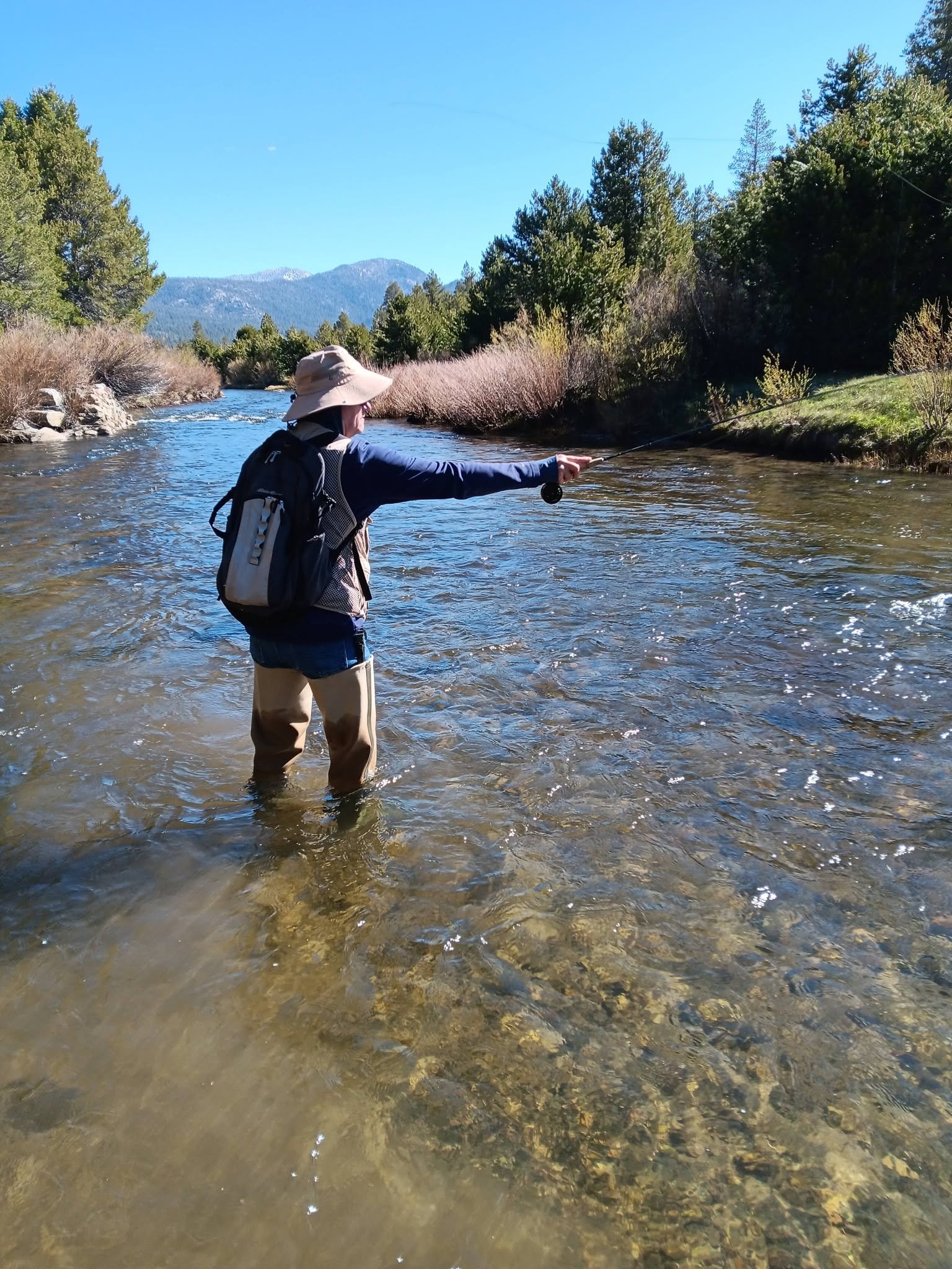 Wader-guided fly fishing